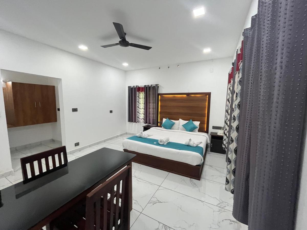 The Mountcourt Hotel Munnar Bagian luar foto