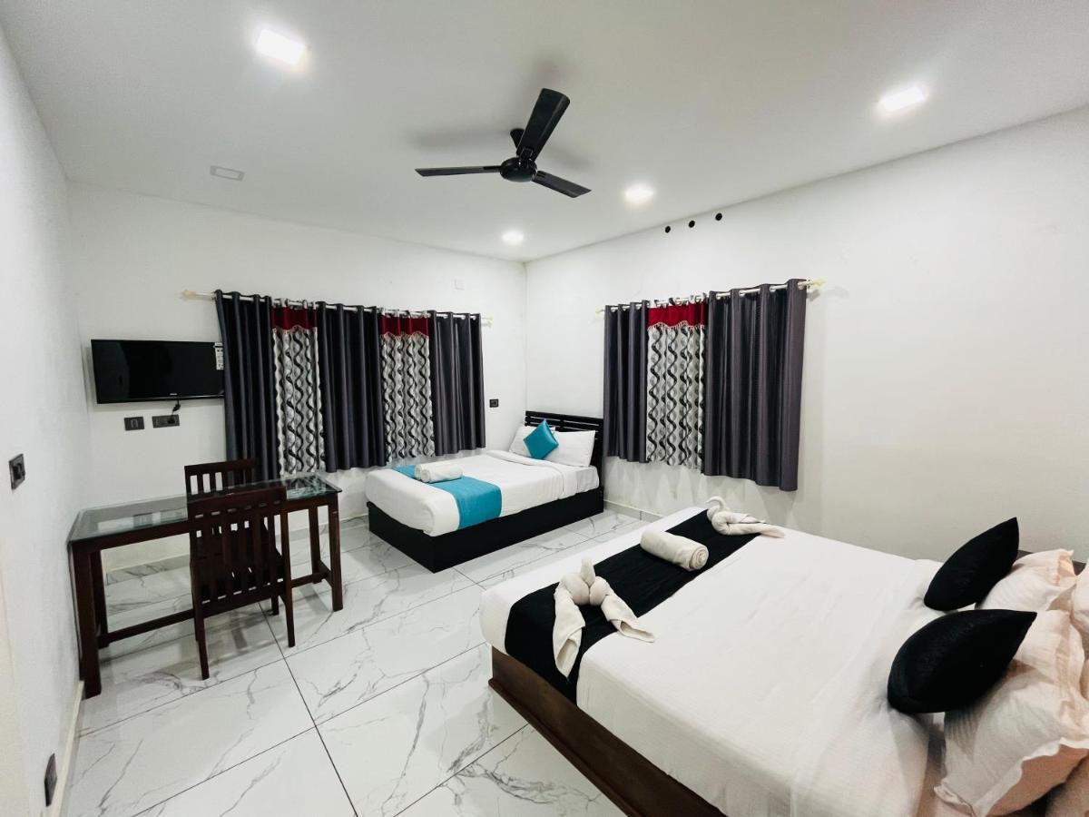 The Mountcourt Hotel Munnar Bagian luar foto